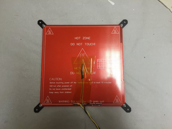 You may use the included clamps to hold the wires while soldering, as shown.