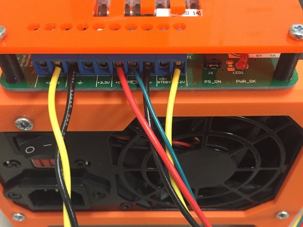 Plug the longer 50&quot; wire into the power supply.