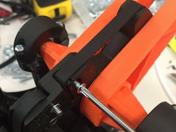 Using the belt trap as a reference, cut the belt to exact size and slip it into the belt trap as shown.  Make sure there is no slack in the belt when you cut it to size.