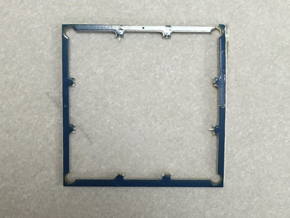 The ELP USB camera comes from the factory with a frame.  Carefully snap this off using a pair of needle-nosed pliers.