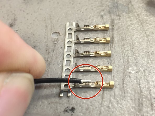 Strip the included 42&quot; wire included in the Uploading Camera Hardware Set by 2-3 millimeters.  Refer to the picture.  Do not strip more than this, as the crimp will not be usable.