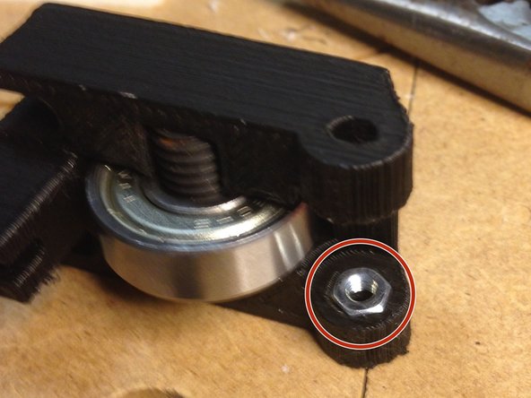 Insert nut into mount