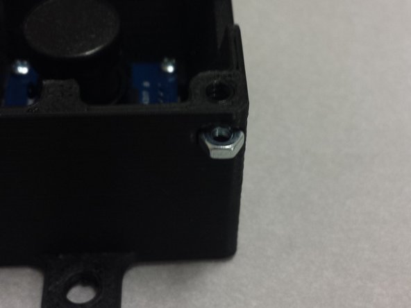 Insert 4x M3 nuts into the side of the housing