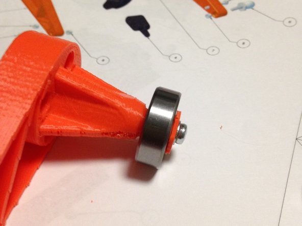 Insert screw into arm