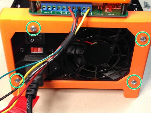 Attach frame to power supply using 6-32 screws