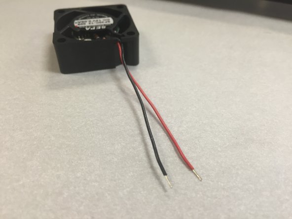 Strip the wires on the ends of both the fan and the cable.