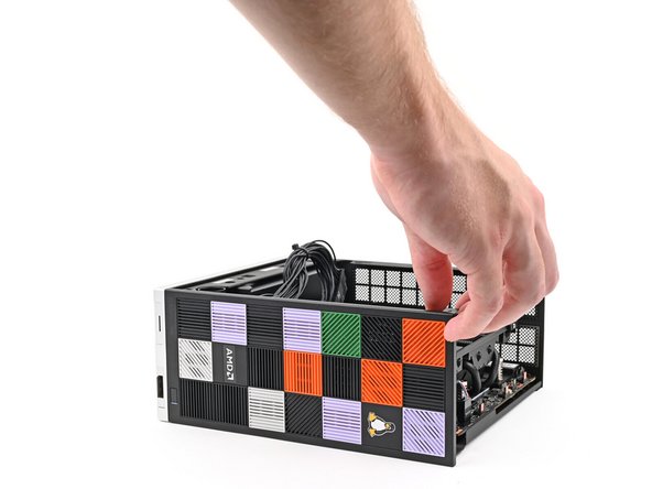 Rotate the Desktop onto its right side so the Mainboard is facing upward.