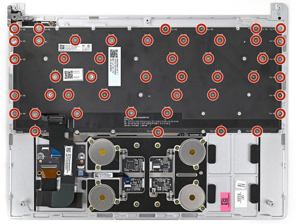 Use your Framework Screwdriver to install the forty-six 1.2 mm‑long black PH0 screws securing the Keyboard.
