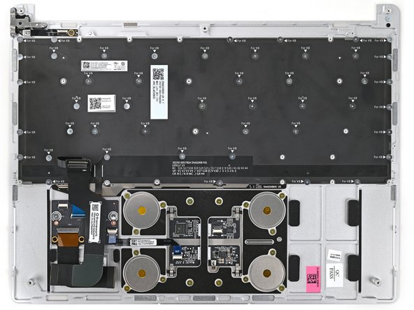The screw holes for the Keyboard are labeled with "KB" and an arrow pointing to them.