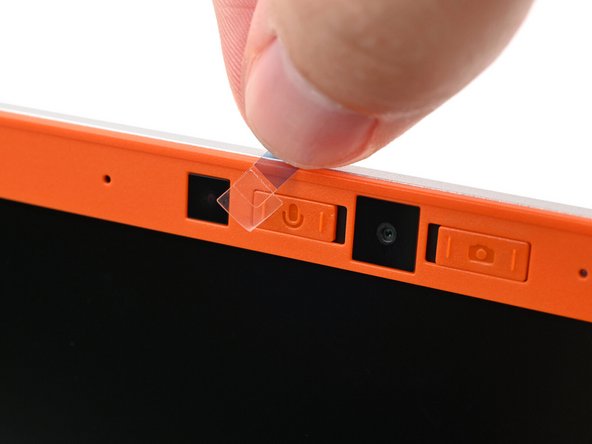 If there are any plastic liners covering the webcam and microphone, remove them.