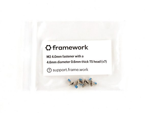 Use the silver screws labeled "M2 4.0mm fastener with a 4.6mm diameter 0.6mm thick T5 head" to secure the hinges to the Bottom Cover.