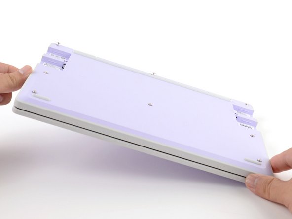 Flip the laptop face-down.