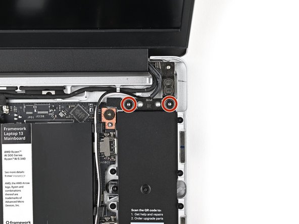 While supporting the Top Cover with one hand, use your Framework Screwdriver to install two 4.0 mm‑long T5 Torx screws on each Hinge connected to the Bottom Cover (four total).