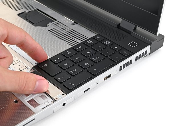 Lay the Input Module on the laptop and let the magnets pull the keyboard into place