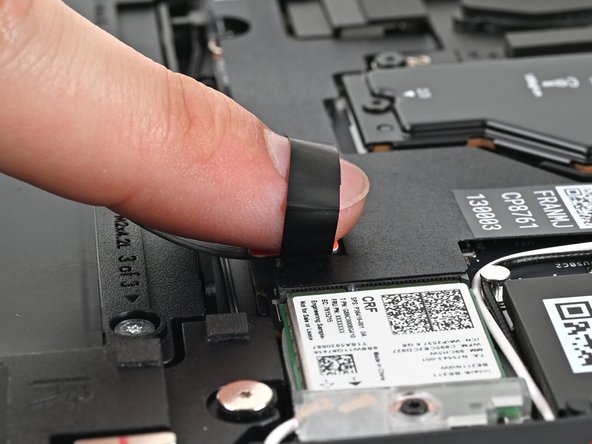Align the press connector over its socket and press down with your finger.