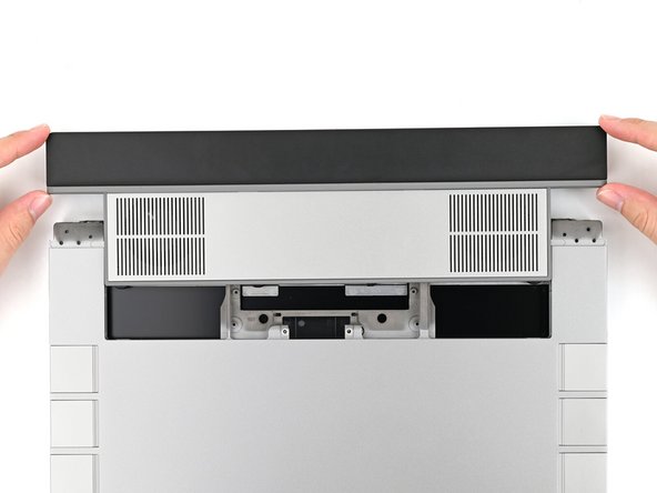 Slide the Expansion Bay Module out of the laptop and remove it.