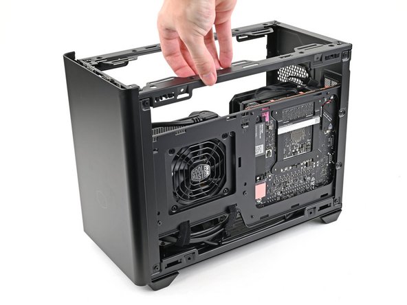 Lay your case down so the bottom of the Mainboard is facing upright.