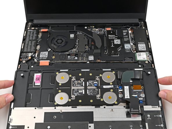 This allows the Touchpad Cable to be folded over and reconnected without straining it.