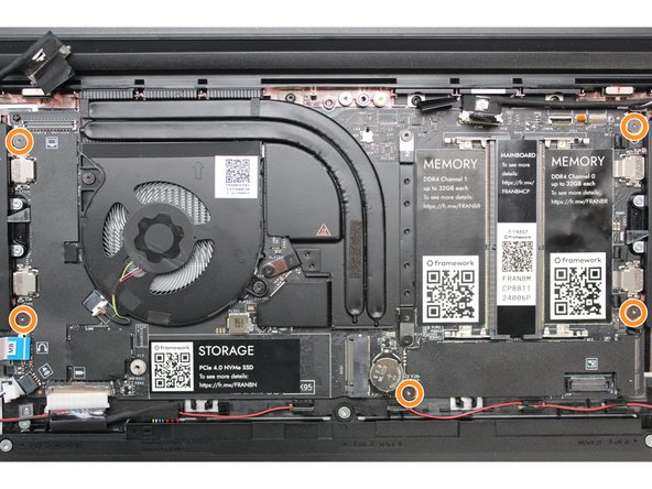 Using the T5 bit in the Framework Screwdriver, unscrew the five fasteners holding down the Mainboard.