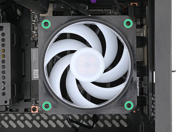 Use your Framework Desktop Screwdriver to install the four 27.3 mm‑long Phillips screws securing the CPU fan and fan duct.