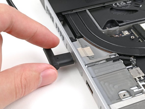 Plug the laptop into a power source.