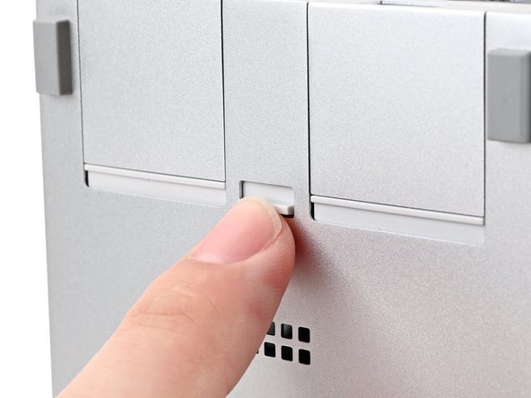 The next two steps show how to remove an Expansion Card.