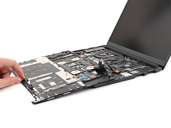 Flip the Input Cover over the laptop and align the bottom edges.