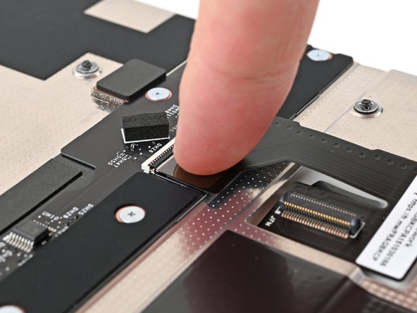 Press the cable to the Mid Plate to re-adhere it.