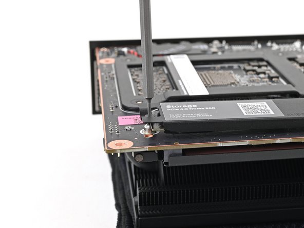 Tighten the screw securing the secondary storage.