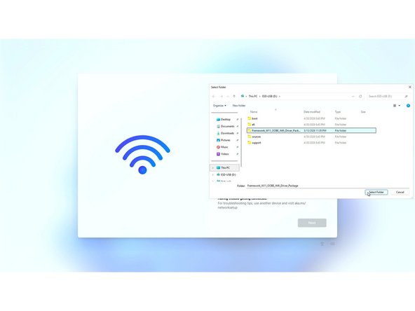 On the "Let's connect you to a network" screen, click the Blue "Install Driver" button in the middle of the page. This will open a File Explorer window.