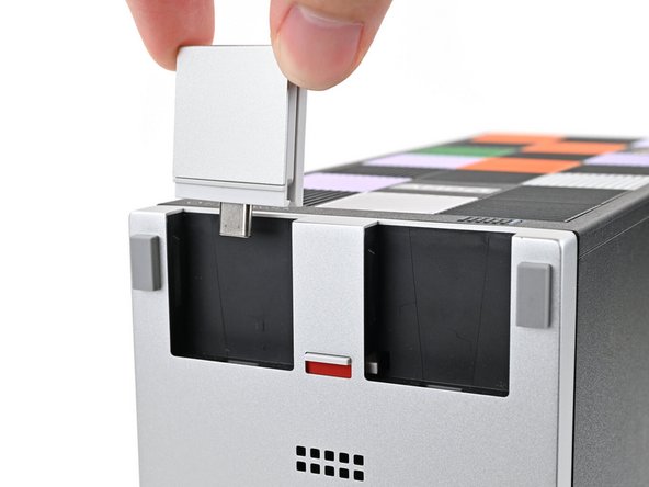 Pull the Expansion Card out of its slot and remove it.