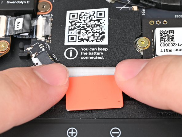 Use your fingers to align the Battery connector with its socket and slide it straight in to reconnect the Battery.