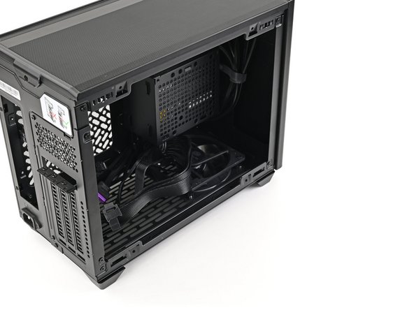 Remove the side panel from your case so you can access the cutout for the Mainboard.
