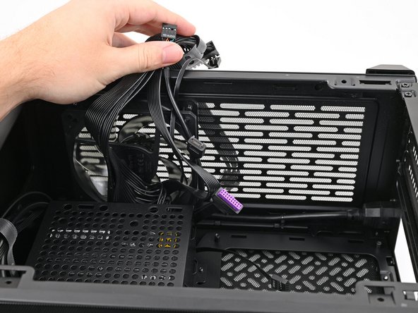 Move the cables out of the way of the Mainboard cutout.