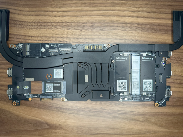 On the metal plate to the left of the CPU, tighten this screw down.