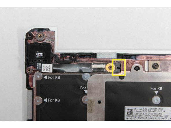 Gently place the module on the Bottom Cover making sure to align the notch in the module with the notch on the Bottom Cover as indicated in the third image.