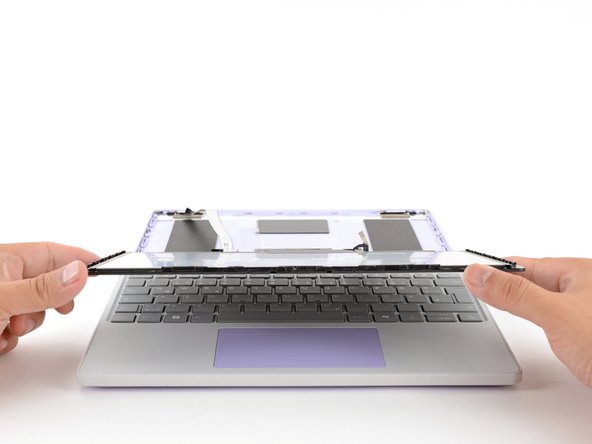 Carefully lift and remove the display.