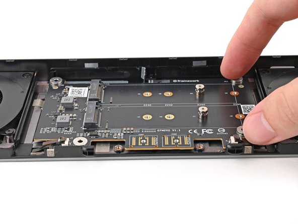 Before continuing, make sure the fan cables aren't trapped under the adapter.