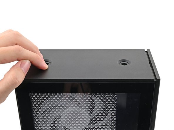 If you're having a hard time gripping the Top Panel, use the screw holes to get a better handhold.