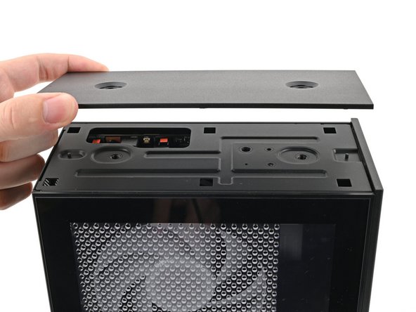 Lift the Top Panel off the chassis and remove it.