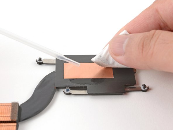 Use the flat end of your Framework Screwdriver to scrape and remove the thermal compound residue from the Heatsink.