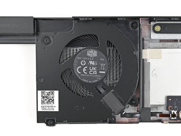 Use your Framework Screwdriver to tighten the four captive Torx T5 screws securing the left fan.