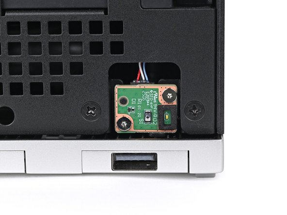 Use your Framework Desktop Screwdriver to install the two 4.5 mm‑long screws securing the Power Button Board.