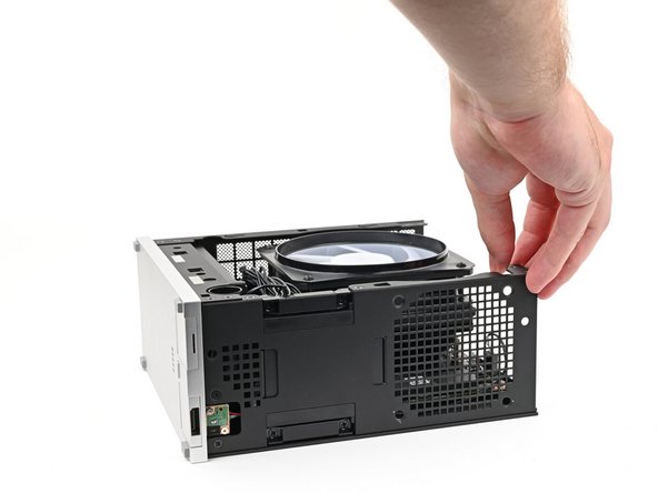 Rotate the Desktop onto its right side so the Mainboard is facing upward.