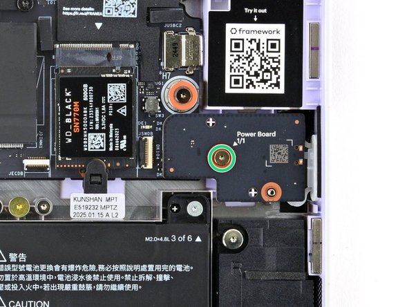 Use your Framework Screwdriver to loosen the captive T5 Torx screw securing the Power Button Board (labeled &quot;Power Board&quot;).