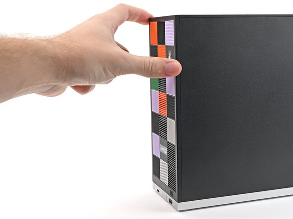Use your fingers to pull the Front Panel off the magnets securing it to the chassis.