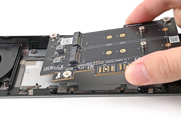 Once you place the Dual M.2 Adapter, it's difficult to remove it without damaging the thermal pad. Take your time and work slowly to ensure the adapter is aligned properly.