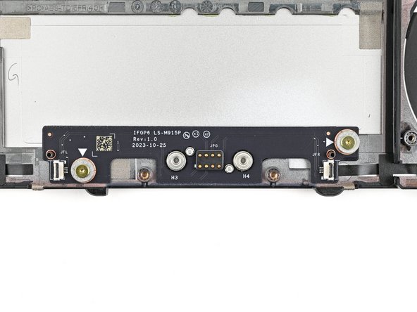 Use your Framework Screwdriver to install the two 3.6 mm‑long screws securing the Expansion Bay Shell Fan Board.
