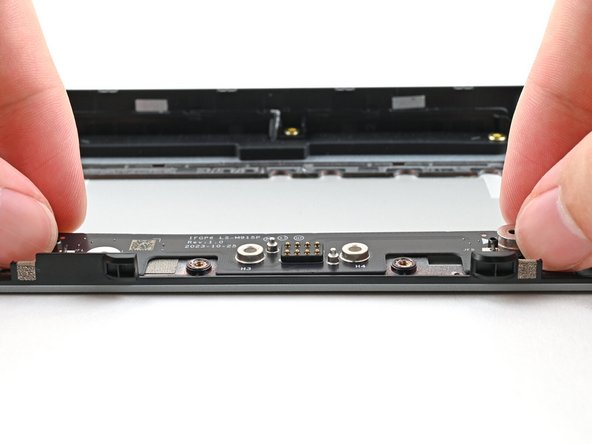 Place the board straight on its alignment pegs on the Expansion Bay Shell.