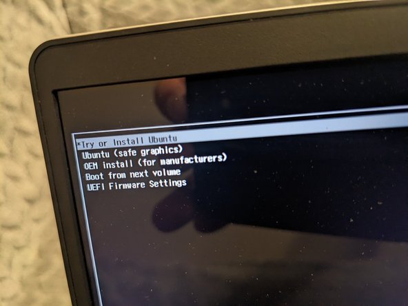 Boot to Live Ubuntu USB:  Insert the USB drive into the powered-off machine, then power it on.